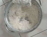 A picture of step 10 of Monster Oreo Cake with Oreo Buttercream Frosting.