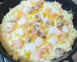 A picture of step 2 of Cheese, Seafood, and Corn Pizza-Style Okonomiyaki.