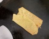 A picture of step 3 of Schezwan Besan Chilla Envelopes.