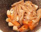 A picture of step 1 of Simmered Konnyaku.