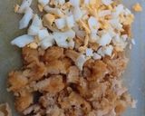 A picture of step 2 of Chicken Omlate covered sandwiches.