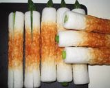 A picture of step 3 of Asparagus in Chikuwa Wrapped in Pork Belly.