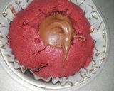 A picture of step 6 of Red Velvet çhoçolate inside Cupcakes with cream cheese frosting.