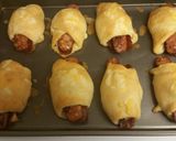A picture of step 4 of Cheddar Jalapeno Sausage Bacon Kolaches.