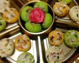 A picture of step 3 of Almond burfi Different colours and shapes of burfis.