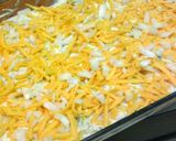A picture of step 6 of sour cream and cheese enchiladas.