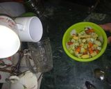 A picture of step 5 of Tomato Cups Sprout Salad.