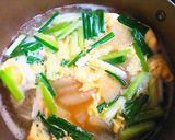 A picture of step 6 of Daikon Radish & Egg in Beef Stock Soup.
