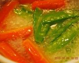 A picture of step 3 of Glazed Carrots and Greens.