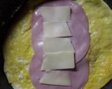 Sajtos-sonkás tortillatekercs recept fázis 1 fotója
