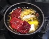 A picture of step 4 of Ajillo with Japanese Leek and Dried Tomatoes.