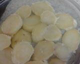 A picture of step 4 of Cheesey potatoe, Bacon + Onion Bake.