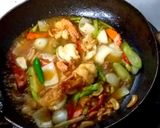 รูปขั้นตอนการทำที่ 5 ของ กุ้งผัดเม็ดมะม่วง