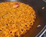 Foto del paso 6 de la receta: Arroz seco de muslitos de pollo