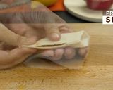 A picture of step 3 of Chicken bread parcels.