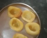 A picture of step 2 of Paneer stuffed potatoes in masala gravy.