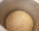 A picture of step 1 of Double tadka lahsuni Urad Dal.