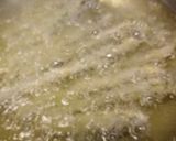 A picture of step 3 of Deep fried asparagus.