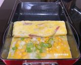 A picture of step 7 of Corn and Sausage Tamagoyaki.