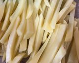 A picture of step 1 of Cheesy fries on the stove.