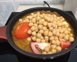 A picture of step 2 of Chickpea And Tomato In Turmeric Sauce.