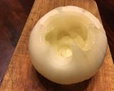 A picture of step 1 of California Farm Stuffed Baked Onions.