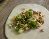 A picture of step 4 of Hara Pyaaz and Sprouts ki masala puri.