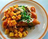 A picture of step 16 of Red Enchiladas with Vegetable Picadillo.