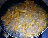 A picture of step 3 of Potato 🥔 chips 🍟 with cheese 🧀.