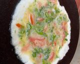 A picture of step 3 of Arabic bread egg sandwich.