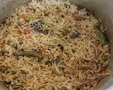 A picture of step 5 of Aloo Matar Pulav.