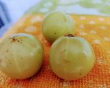 A picture of step 1 of Khatta Meetha Amla Pickle.