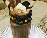A picture of step 2 of Oreo Chocolate Shake.