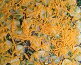Foto del paso 4 de la receta: Papas al horno con cheddar y verdeo