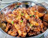A picture of step 9 of Honey chilli potatoes.