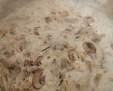 A picture of step 3 of Creamy Mushroom soup, drizzle truffle oil, rustic croutons.
