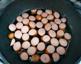 Foto del paso 2 de la receta: Huevo revuelto con hot dog y queso andino