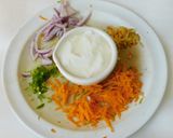 A picture of step 1 of Carrot onion raita.