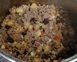 A picture of step 3 of Regina's Picadillo (with Apple, Almonds, and Cranberries) 👌🏼🤤.