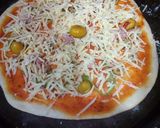 صورة لخطوة 4 من وصفة بيتزا سريعة🍴
