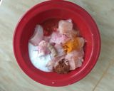 A picture of step 1 of Chicken 65.