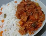 A picture of step 4 of Beef and mushroom stew paired with garnished coconut rice.