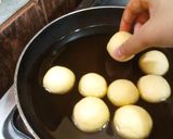 A picture of step 9 of Gullab gamoon.