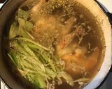 A picture of step 3 of California Farm Cornish Chicken Consommé for 2.
