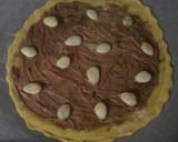 Foto del paso 2 de la receta: Pizza de chocolates y almendras