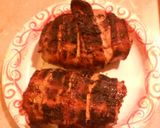 A picture of step 7 of Bacon wrapped stuffed Pork chops.