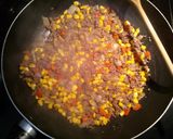 A picture of step 3 of Beefy penne carbonara pasta.