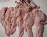 A picture of step 5 of Chicken Wing Gyoza (with chicken de-boning instructions).