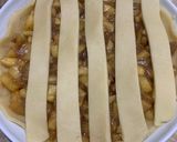 A picture of step 9 of Apple pie with flaky butter crust served with vanilla ice cream.