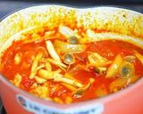 A picture of step 6 of Chicken Tomato Stew with Oregano.